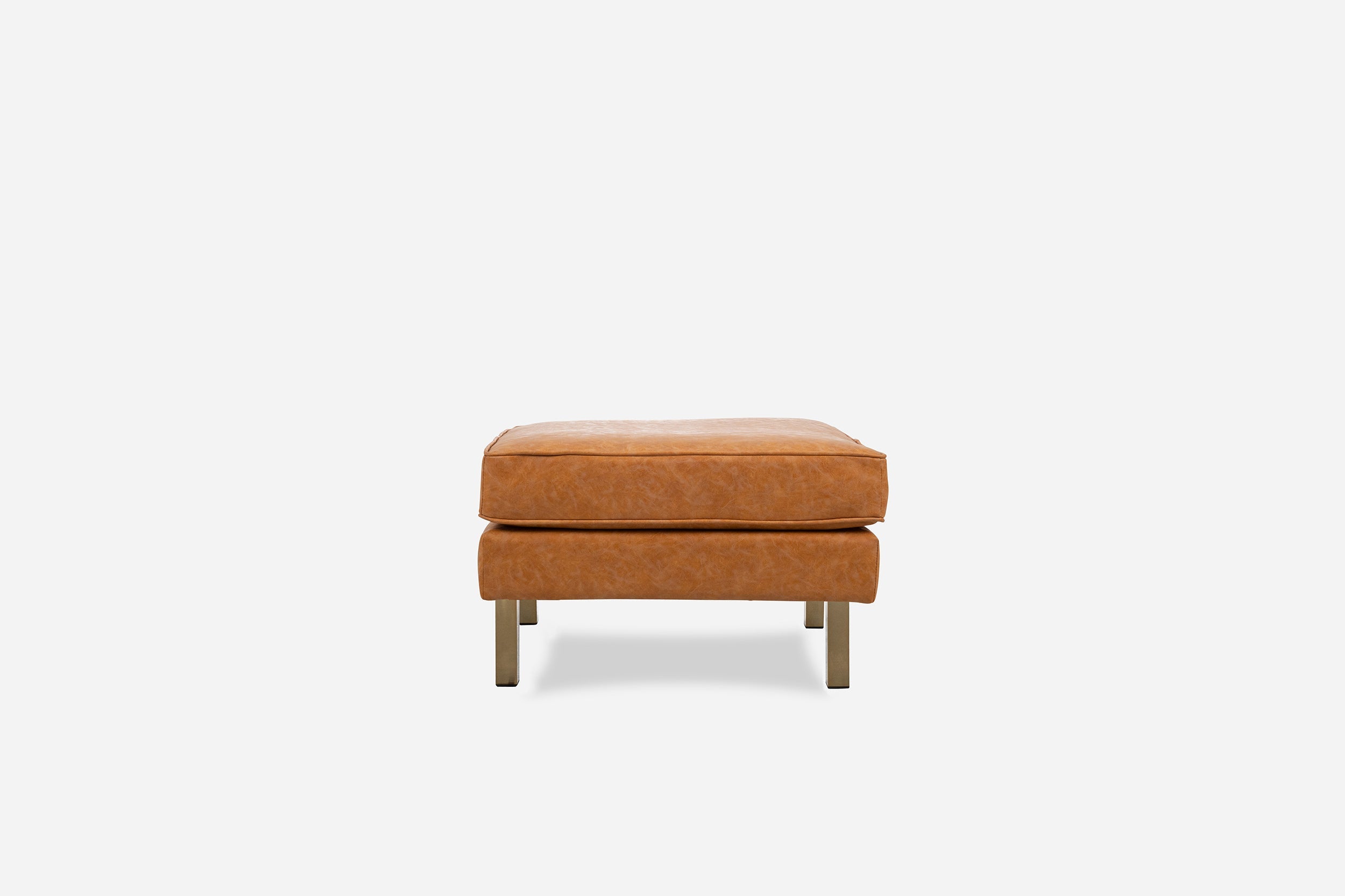 distressed vegan leather gold | Albany Ottoman shown in distressed vegan leather with gold legs